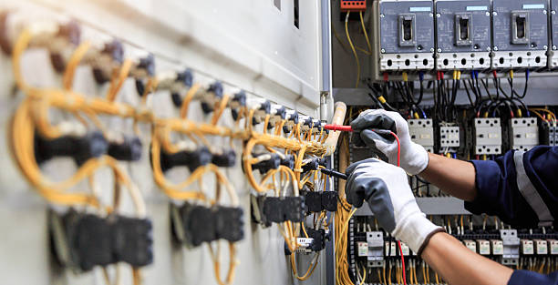 Professional Electrician technician working in Charles City, IA